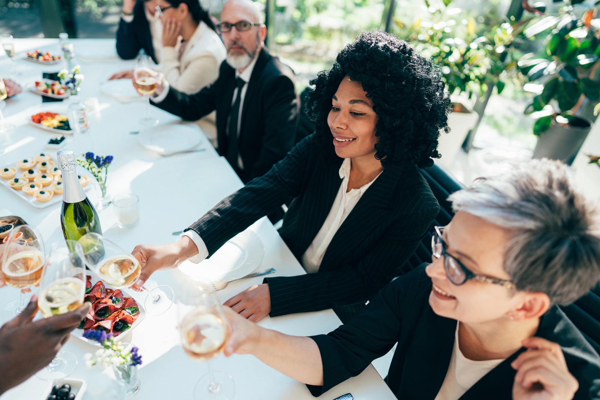 Businessmen and businesswomen making a corporate party